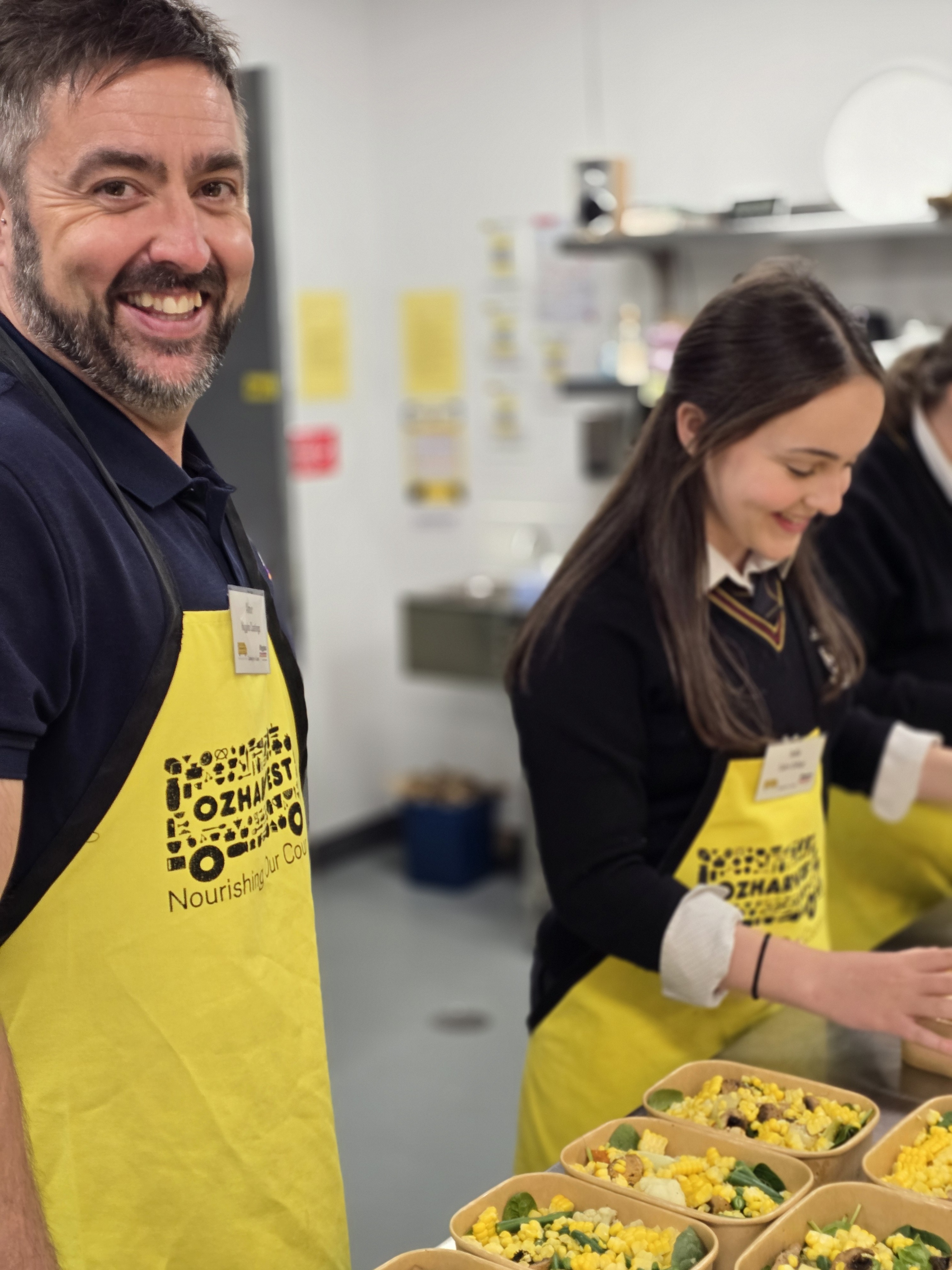 Higgins staff and SEDA College students pose outside the Higgins office.
