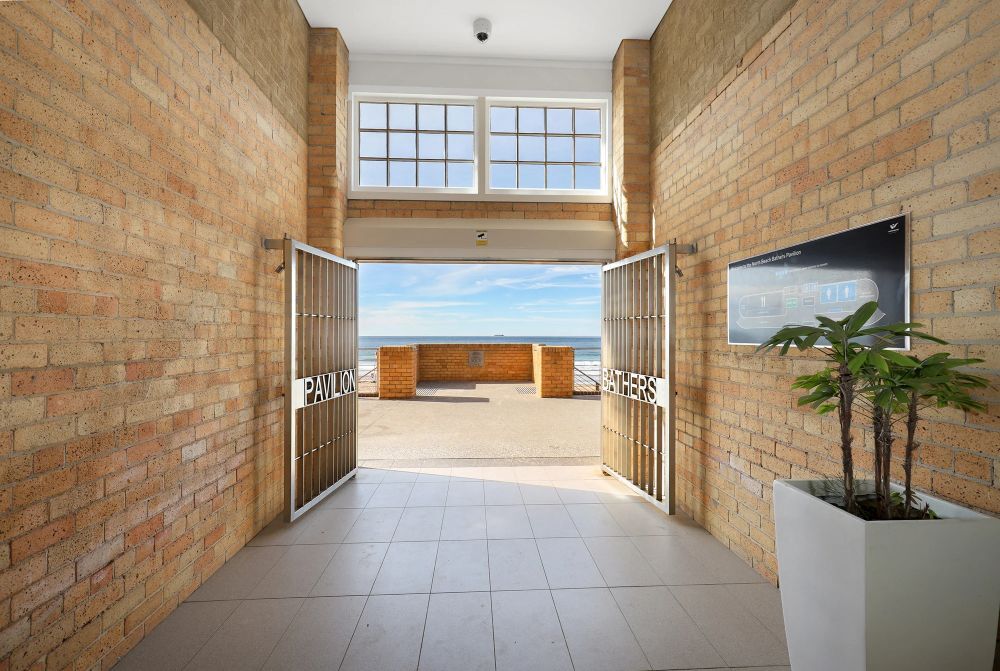 Brick hallway with open